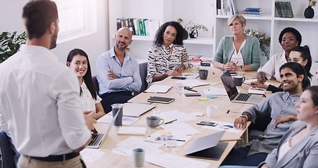 Image showing Diversity, businesspeople planning and sitting at table in a boardroom at workplace. Presentation or business meeting, collaboration and people talking or brainstorming together at their work