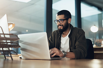 Image showing Smile, work and a businessman with a laptop for an email, communication or online coding. Happy, programming and a male programmer typing on a computer for web or software development in an office