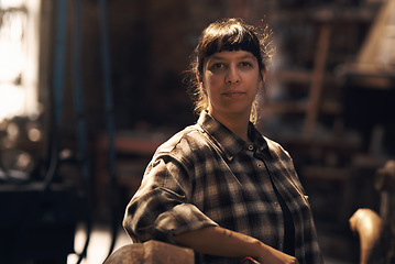 Image showing Woman blacksmith, portrait and workshop for industry, trade or artisan job for entrepreneurship. Small business owner, female entrepreneur or confident in factory, industrial warehouse or metalwork