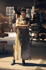 Image showing Blacksmith, workshop and portrait of woman with crossed arms for industry, manufacturing and welding. Industrial factory, warehouse and female person for steel, iron and metal production in foundry