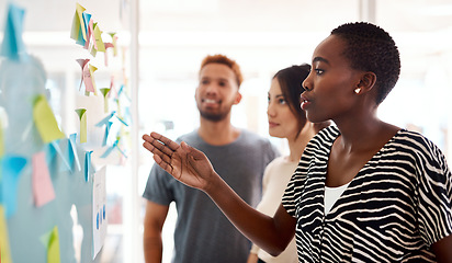 Image showing Brainstorming, creative and teamwork with black woman in meeting for speaker, branding and planning. Collaboration, goals and idea with business people in office for schedule, solution and moodboard