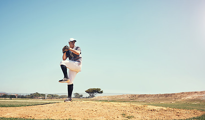 Image showing Games, sports and baseball with man on field for competition, training or performance. Action, exercise and championship with male athlete throwing in stadium park for fitness, pitch and mockup space