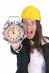 Image showing businesswoman confused and clock 