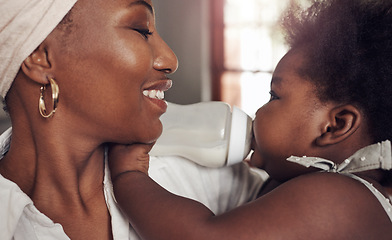 Image showing Bottle, milk and happy with mother and baby for care, bonding and morning. Smile, happiness and food with black woman and feeding newborn infant in family home for nutrition, wellness and growth