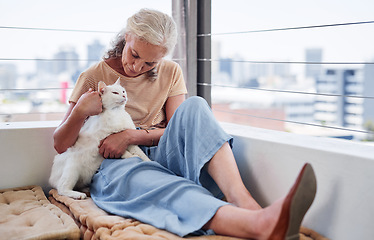 Image showing Senior woman relax with her cat on home floor for mental health, wellness or emotional support, love and care. Elderly person in retirement scratch or cuddle pet, animal or kitten by house or window