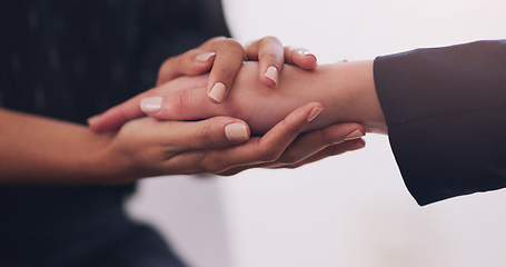 Image showing Closeup, hands and women with support, empathy and comfort with solidarity, teamwork and love. Zoom, female people and friends touching fingers, trust and unity with kindness, bad news and prayer