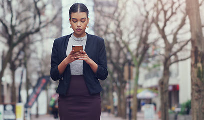 Image showing Outdoor, business and woman with a smartphone, typing and social media with website information and mobile app. Female person, employee or consultant with a cellphone, city or search internet outdoor