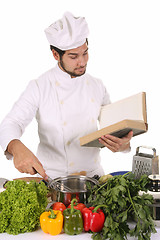 Image showing young chef preparing lunch