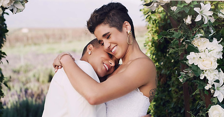 Image showing Love, hug and lgbtq with lesbian couple at wedding for celebration, gay and pride. Smile, spring and happiness with women at marriage event for partner commitment, sexuality and freedom