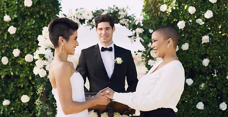 Image showing Love, holding hands and happy with lesbian couple at wedding for celebration, gay and pride. Smile, spring and happiness with women at marriage event for partner commitment, sexuality and freedom