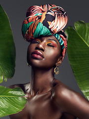 Image showing Beauty, leaf and makeup by black woman in studio for self love or natural cosmetics on grey background. Culture, monstera and face of African lady model with plant for dermatology or jungle aesthetic