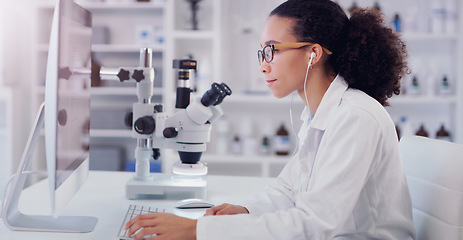 Image showing Computer, music and science with woman in laboratory for research, pharmacy or medical. Healthcare, technology and study analysis with female scientist and focus for medicine, expert or online report