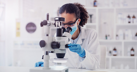 Image showing Science, covid and pharmacy with woman and microscope in laboratory for expert research, medical and planning. Idea, vaccine analysis and medicine with female scientist for chemistry and healthcare