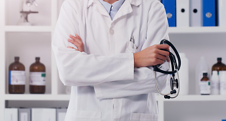 Image showing Closeup, doctor and arms crossed with stethoscope in lab for healthcare, medical research and innovation. Laboratory worker, scientist and development in cardiology, pharmaceutical science and test