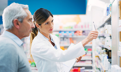 Image showing Store shelf, senior man and pharmacy woman, advice and recommendation of pills, medicine or prescription drugs. Customer, healthcare support and female pharmacist helping old person with decision