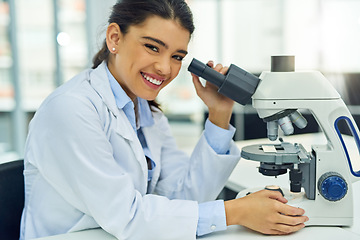 Image showing Scientist, portrait and smile of woman with microscope in laboratory for medical research. Face, science and female doctor with lens equipment for sample analysis, particle test and lab experiment.