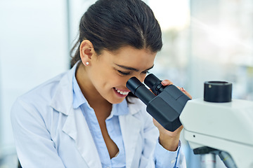 Image showing Research, woman and scientist smile with microscope in laboratory for medical study. Investigation, science and female doctor with DNA sample for future analysis, particle test or lab experiment.