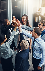 Image showing Motivation, high five and success with business people in office for support, winner and teamwork. Collaboration, diversity and community with group of employees for solidarity, target and goals