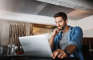 Image showing Laptop, research and male freelancer in a coffee shop reading for a freelance project. Remote work, technology and man thinking, browsing and working online with a computer at a cafe or restaurant.