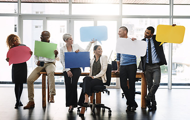 Image showing Business people, speech bubble and group with diversity, teamwork or social media for opinion on sign, Men, women and poster for social media, vote or review with ideas, smile and mock up in office