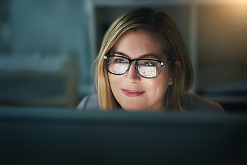 Image showing Businesswoman, glasses and working late on a computer or or overtime for a project deadline or schedule and in an office. Research, email and face of corporate worker or analysis and online at night