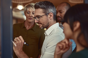 Image showing Businessman, coach and writing in schedule planning for team brainstorming, collaboration or strategy at office. Man employee in leadership, coaching or training staff in teamwork for project plan