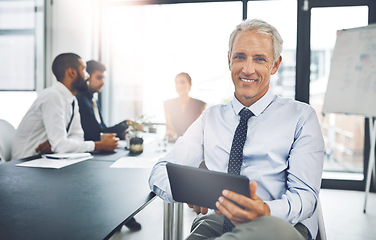 Image showing Meeting, portrait of senior ceo businessman with tablet and in modern office with his team. Workshop, technology and corporate male person or leader and in a boardroom brainstorming or planning.