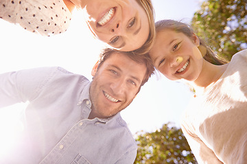 Image showing Nature portrait, blue sky and happy family love of child, mother and father bonding in park, forest or outdoor woods. Freedom, happiness or below view of mama, papa and kid smile for natural sunshine