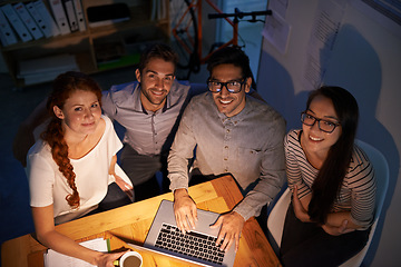 Image showing Portrait, teamwork and night with developer group on a laptop, working overtime for planning, problem solving or web design from above. Meeting, collaboration and IT colleagues at work in the evening