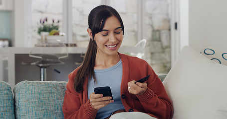 Image showing Happy woman, credit card and online shopping on smartphone in home for digital payment, fintech or money transfer. Female, mobile banking and finance of cash, web sales and password for financial app
