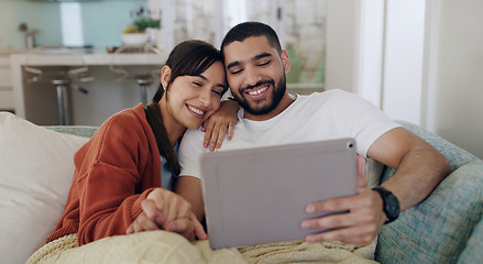 Image showing Tablet, happy couple and relax on couch in home for social media, online entertainment and love. Young man, woman and digital technology for web subscription, streaming movie and network connection