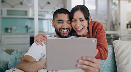 Image showing Tablet, couple and smile on couch in home for social media, website and online entertainment. Happy man, excited woman and relax on digital technology, subscription or streaming connection on network