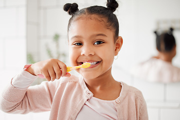 Image showing Child, toothbrush and brushing teeth in a home bathroom for dental health and wellness with smile. Face portrait of african girl kid cleaning mouth with a brush for morning routine and oral self care