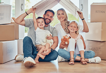 Image showing Portrait of happy family, new home and cardboard roof for insurance, safety and future investment in real estate. Moving, boxes and happiness, mom and dad with kids in house with property mortgage.