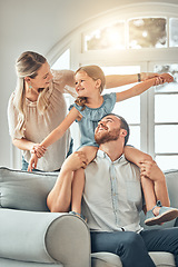 Image showing Mom, dad and child on sofa with flying game, piggy back and playful fun in living room for happy family. Mother, father and kid playing airplane games on couch with smile, happiness and love in home.