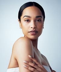 Image showing Skincare, makeup and portrait of woman isolated on a white background for skin glow, shine and beauty for luxury. Face of young model or biracial person, natural cosmetics or dermatology in studio