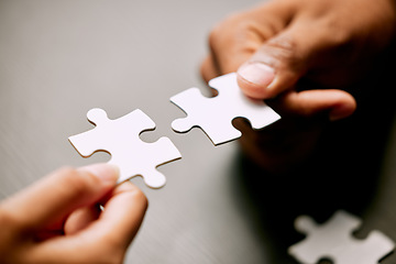 Image showing Puzzle, hands and people or partner for solution, teamwork and goals, achievement or workflow success. Team building, games and development of person or team problem solving, synergy or collaboration