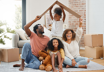 Image showing Black family, floor and cardboard roof in home living room with game, laughing and bond with love. Father, mother and daughter with play, relax of box for sign of security in family house with smile