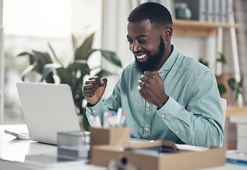 Image showing Success, black man and laptop to celebrate business profit, win or achievement in an office. African male entrepreneur at a desk with motivation, fist and technology for bonus, victory or promotion