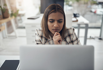 Image showing Thinking, focus and woman on laptop in office for solution, research and serious job decision or planning. Reading, review and choice of african person or business analyst on computer problem solving