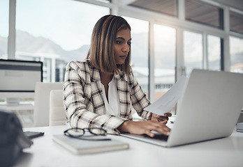 Image showing Laptop, data documents and woman typing in office workplace for business. Paperwork analysis, computer and female person reading info for analyzing analytics, graphs or charts for finance statistics.