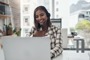 Image showing Laptop, business woman and headset for a video call or webinar with internet connection. Happy female person with technology for crm communication, online meeting and customer support in an office
