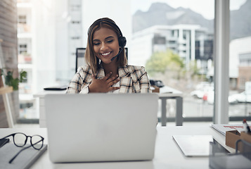 Image showing Business woman, headset and laptop for a video call or webinar with internet introduction. Female person with technology for crm communication, online meeting and customer support in a modern office