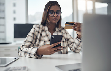 Image showing Business, smartphone and woman with a credit card, ecommerce and finance sales in a modern office. Female person, employee or agent with payment, cellphone and transaction with fintech app and retail