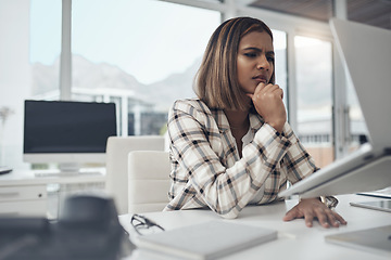 Image showing Thinking, confused and business woman on computer solution, research or serious job decision or planning. Reading, review and doubt or ideas of african person or analyst on laptop for problem solving