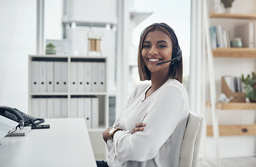 Image showing Telemarketing, business and woman with arms crossed, portrait and customer service in a modern office. Face, female person or employee with a smile, headphones and professional with a career and help