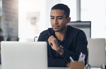 Image showing Thinking, news and report with a man journalist working in his management office at the editing agency. Review, journalism and idea with a young male editor at work on an article for reporting