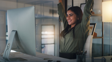 Image showing Night, business and woman with achievement, celebration and cheering with internet connection, happiness and joyful. Female person, employee and agent with a smile, computer and success with an email