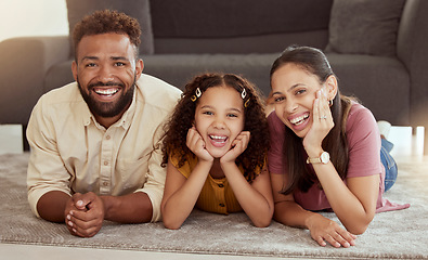 Image showing Family home, portrait and youth with mom, dad and young girl together with fun. Living room, mother and father with a child by sofa with love, bonding and parent support with a smile in lounge