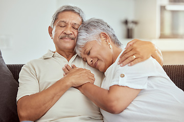 Image showing Love, relax and hug with old couple on sofa for affectionate, bonding and happiness. Retirement, happy and calm with senior man and woman in living room of home for embrace, safety and trust